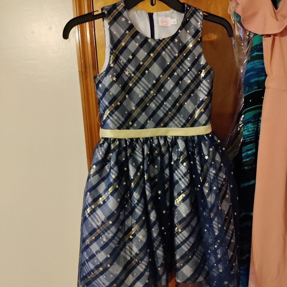 🦋 2 for $10 Nwot the pics  do not do this dress justice. has star sheer overlay
